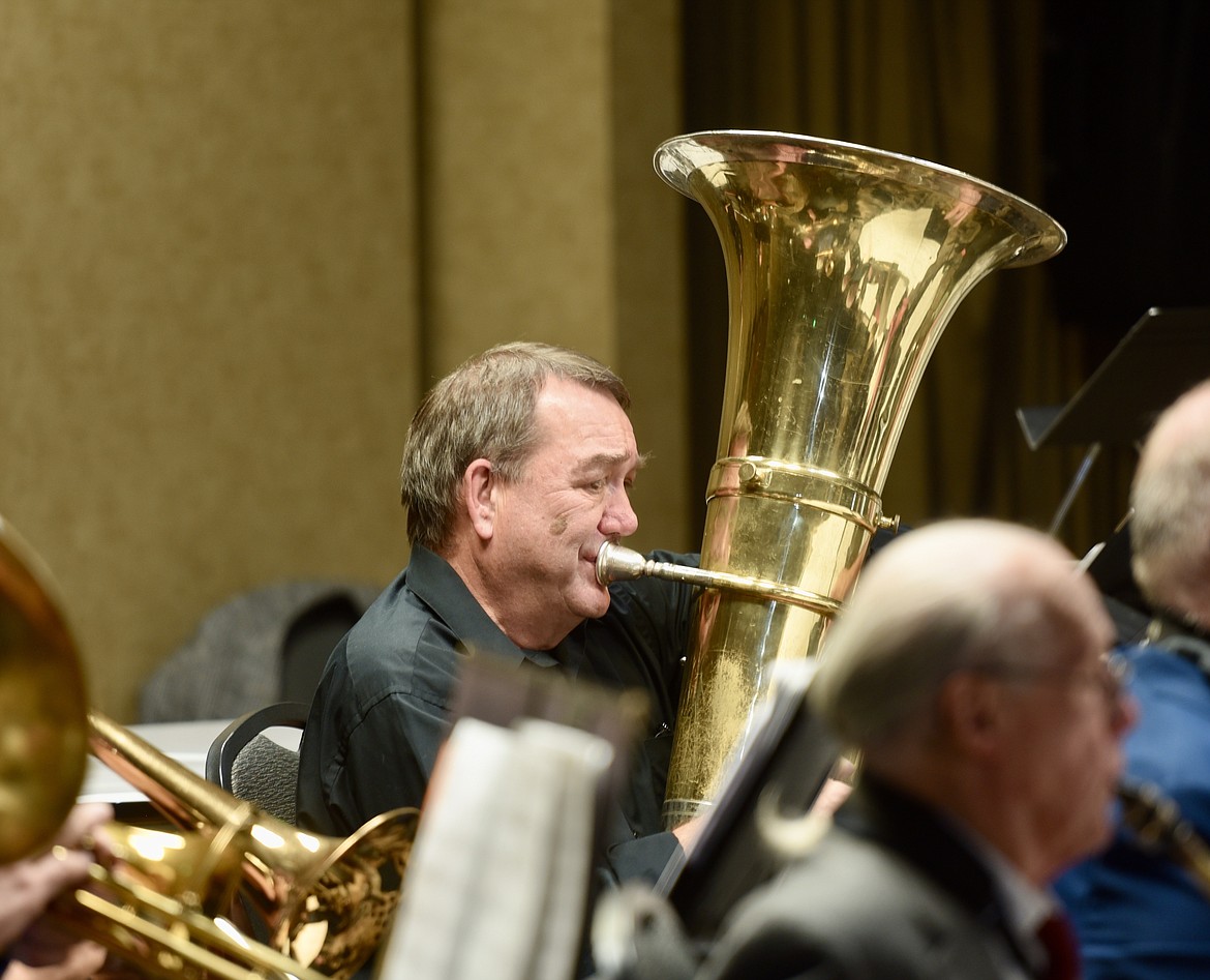 Neil Lawrence plays the tuba with the Flathead Valley New Horizons Band during their fall concert Oct. 19 at the Red Lion in Kalispell. (Heidi Desch/Daily Inter Lake)