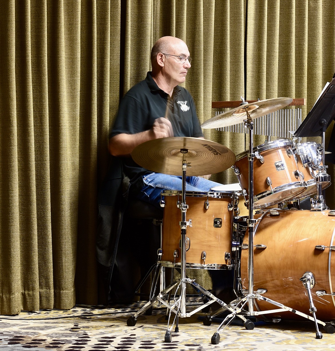 Joe Clark on the drums during the Flathead Valley New Horizons Band concert Oct. 19 at the Red Lion in Kalispell. (Heidi Desch/Daily Inter Lake)