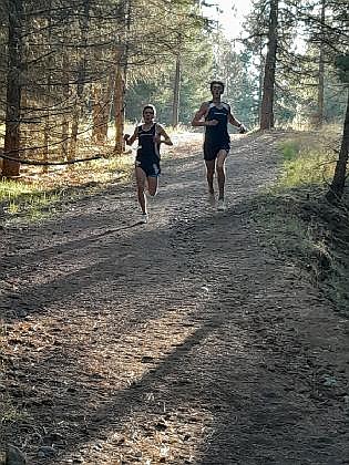 Courtesy photo
Timberlake's Caleb Royce, left, and Jacob Barnhart navigate a trail during the 3A District 1 cross country race on Oct. 19 at Farragut State Park in Athol. The state meet in all classifications is Saturday at the Portneuf Wellness Complex in Pocatello.