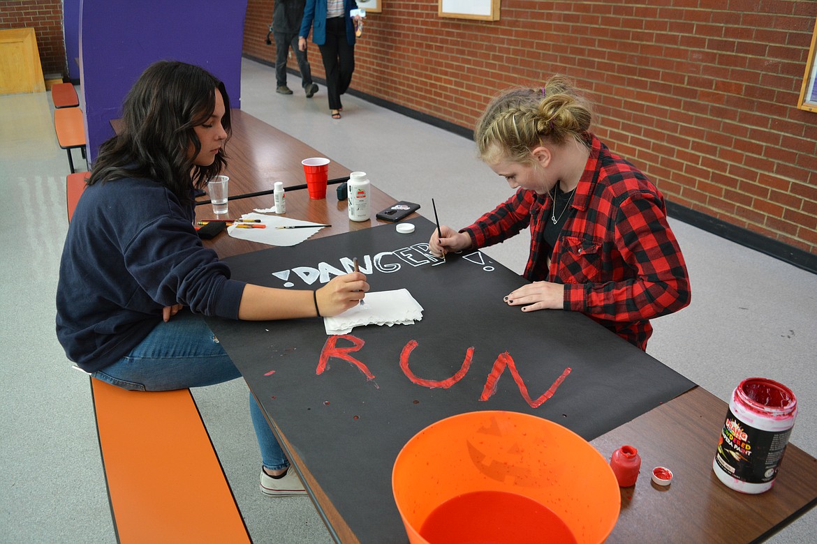 Audrey Hart and Nevaeh Schabell made decorations to add ambiance to the Kellogg High School Haunted House.