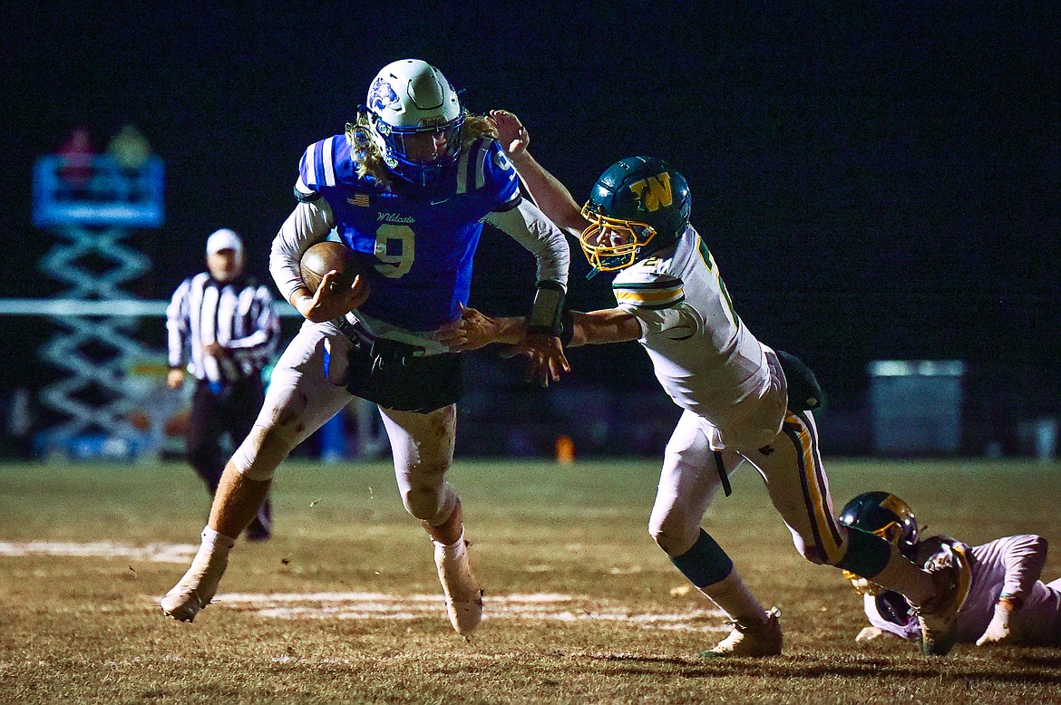 Columbia Falls quarterback Cody Schweikert runs for a touchdown in the second quarter against Whitefish at Satterthwaite Field on Friday, Oct. 27. (Casey Kreider/Daily Inter Lake)