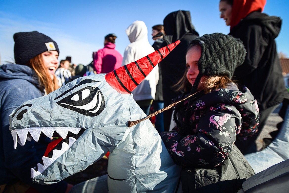 Children in costumes participate in the trunk or treat event at the Boys and Girls Club of Glacier Country headquarters in Evergreen on Saturday, Oct. 28. The event was sponsored by the Flathead County Sheriff Posse, Evergreen Chamber of Commerce and local first responders. (Casey Kreider/Daily Inter Lake)