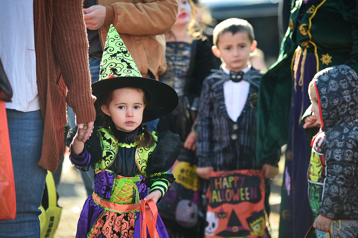 Children in costumes participate in the trunk or treat event at the Boys and Girls Club of Glacier Country headquarters in Evergreen on Saturday, Oct. 28. The event was sponsored by the Flathead County Sheriff Posse, Evergreen Chamber of Commerce and local first responders. (Casey Kreider/Daily Inter Lake)