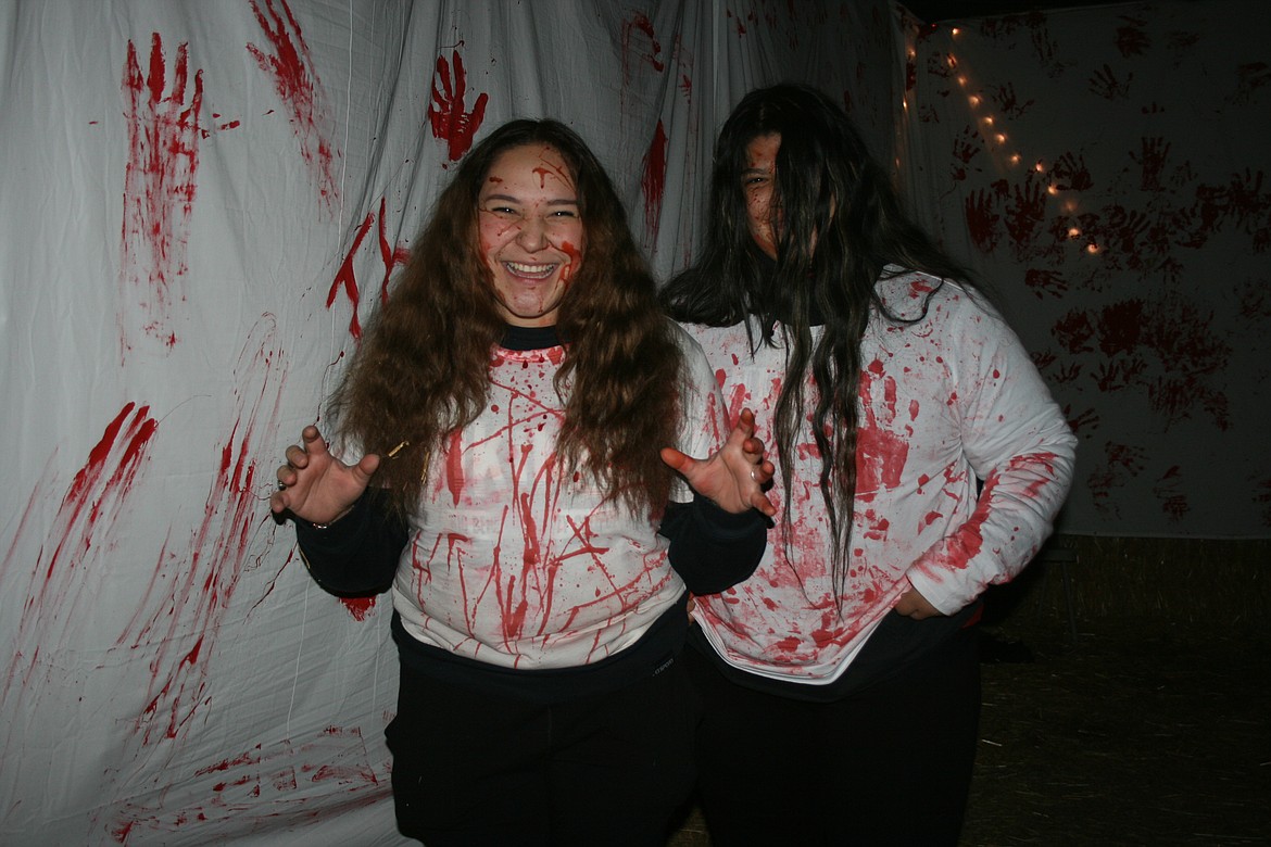 Volunteer scarers work for maximum scare in the Othello Rodeo Association straw maze. The maze’s 2023 finale is Halloween night.