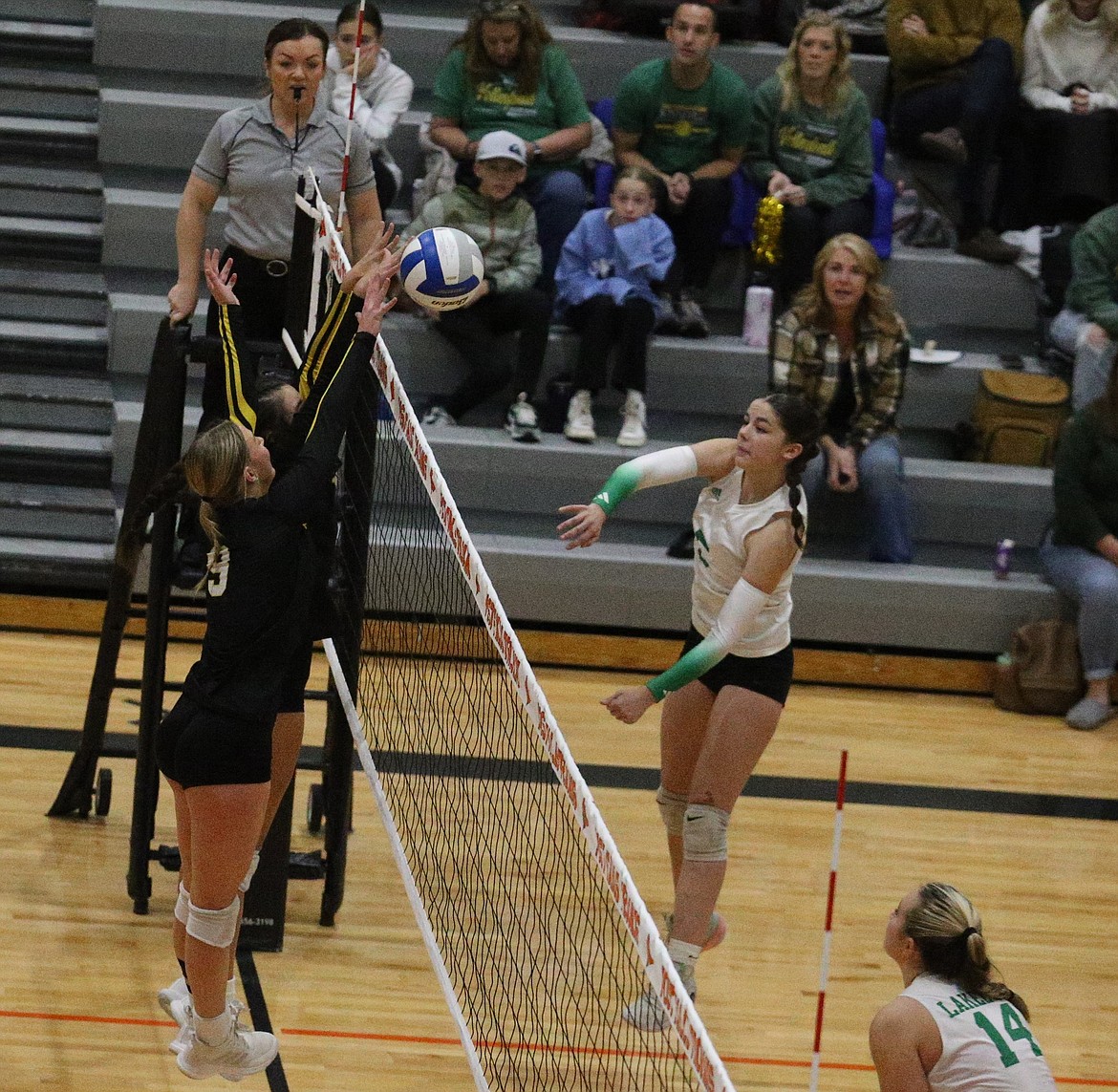 JASON ELLIOTT/Press
Lakeland High sophomore Alyssa Ryckman goes up for a kill against Bonneville during the second set of Saturday's state 4A volleyball tournament match at Post Falls High.