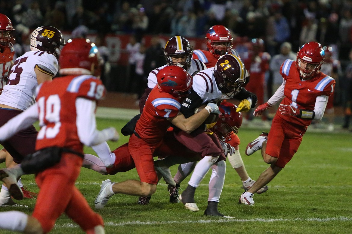 Moses Lake junior Tommy Ransom Jr. fights for extra yards in the first quarter against Eastmont.