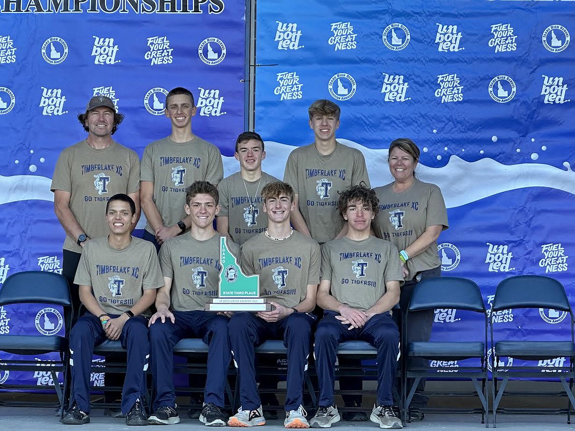 Courtesy photo
The Timberlake boys cross country team finished third in the state 3A meet on Saturday at the Portneuf Wellness Complex in Pocatello. In the back row, from left, are coach Shawn Lawler, Thomas Perry, Jonathan Barnhart and coach Jennifer Hammond. In the front are Jeremiah Alameda, Jacob Howell, Jacob Barnhart and Isaiah Winkler.