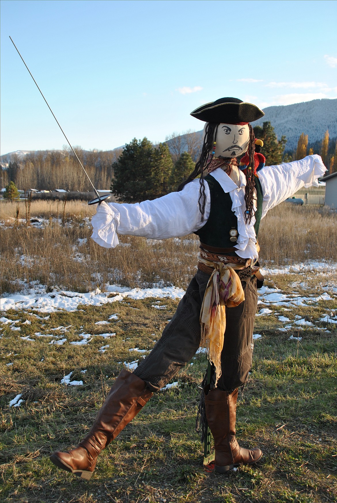 The Two River's Thrift Store in St. Regis had just the right materials to put up this pirate, en garde! And in his front pocket he even had some loot for visitors of Scarecrow Row. (Mineral Independent/Amy Quinlivan)