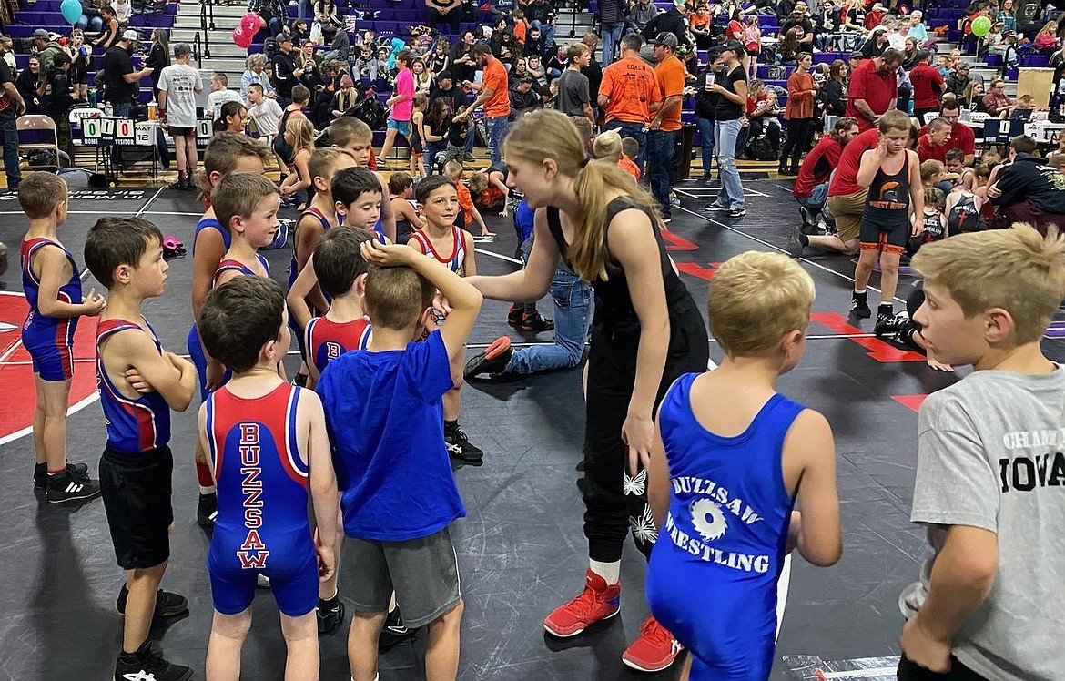 Courtesy photo
Buzzsaw Wrestling Club middle schooler Isabella Maness leading the Bantams in warmups at a North Idaho Wrestling League tournament at Kellogg.