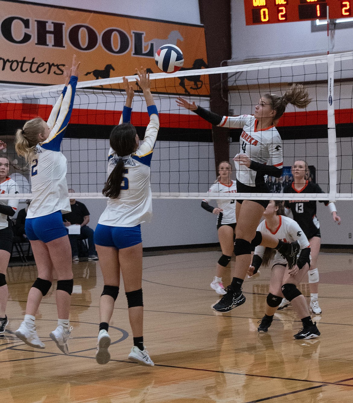 Eureka Lady Lion Kara Stanger at the net against Thompson Falls' Annalise Fairbank and Addy Deal. (Tracy Scott/Valley Press)