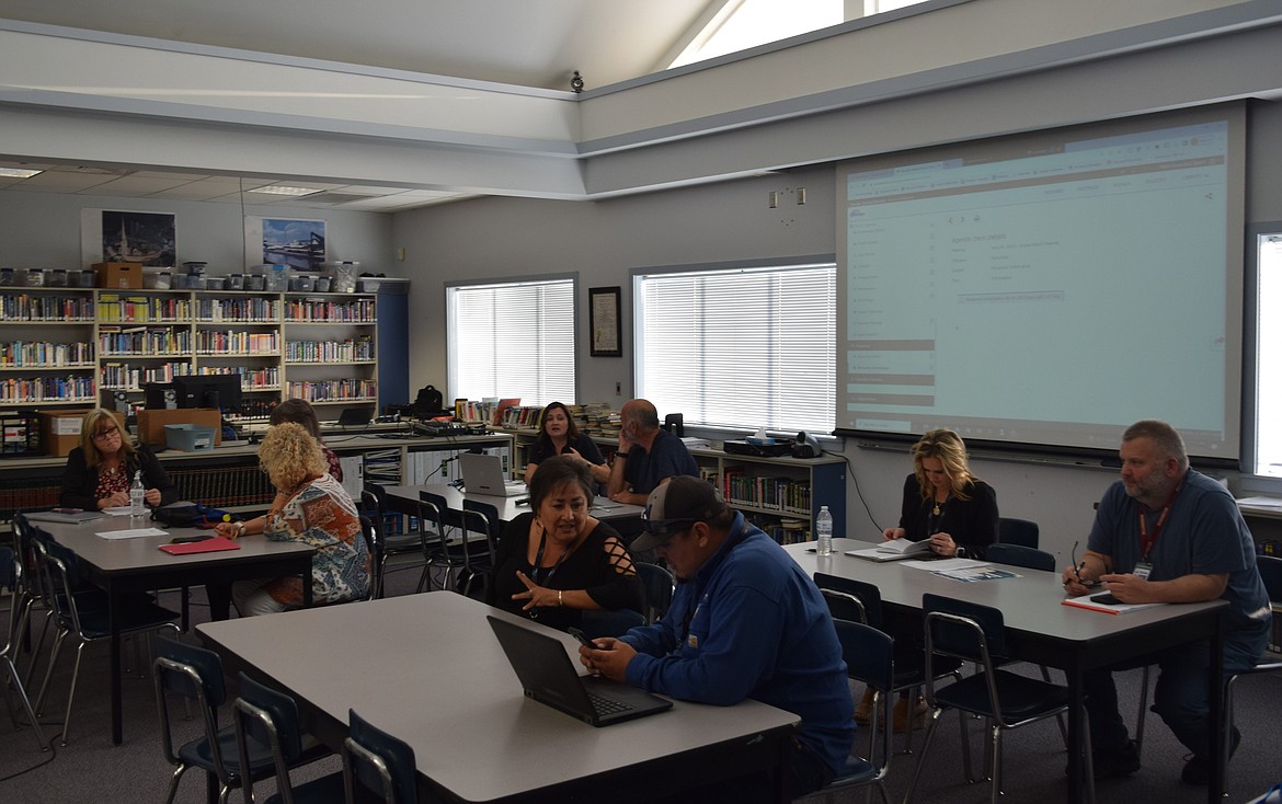 Faculty and staff wait to provide reports during an August Warden School Board meeting. The board also approved the 2023-2026 Public School Employees Collective Bargaining Agreement during Thursday’s meeting.