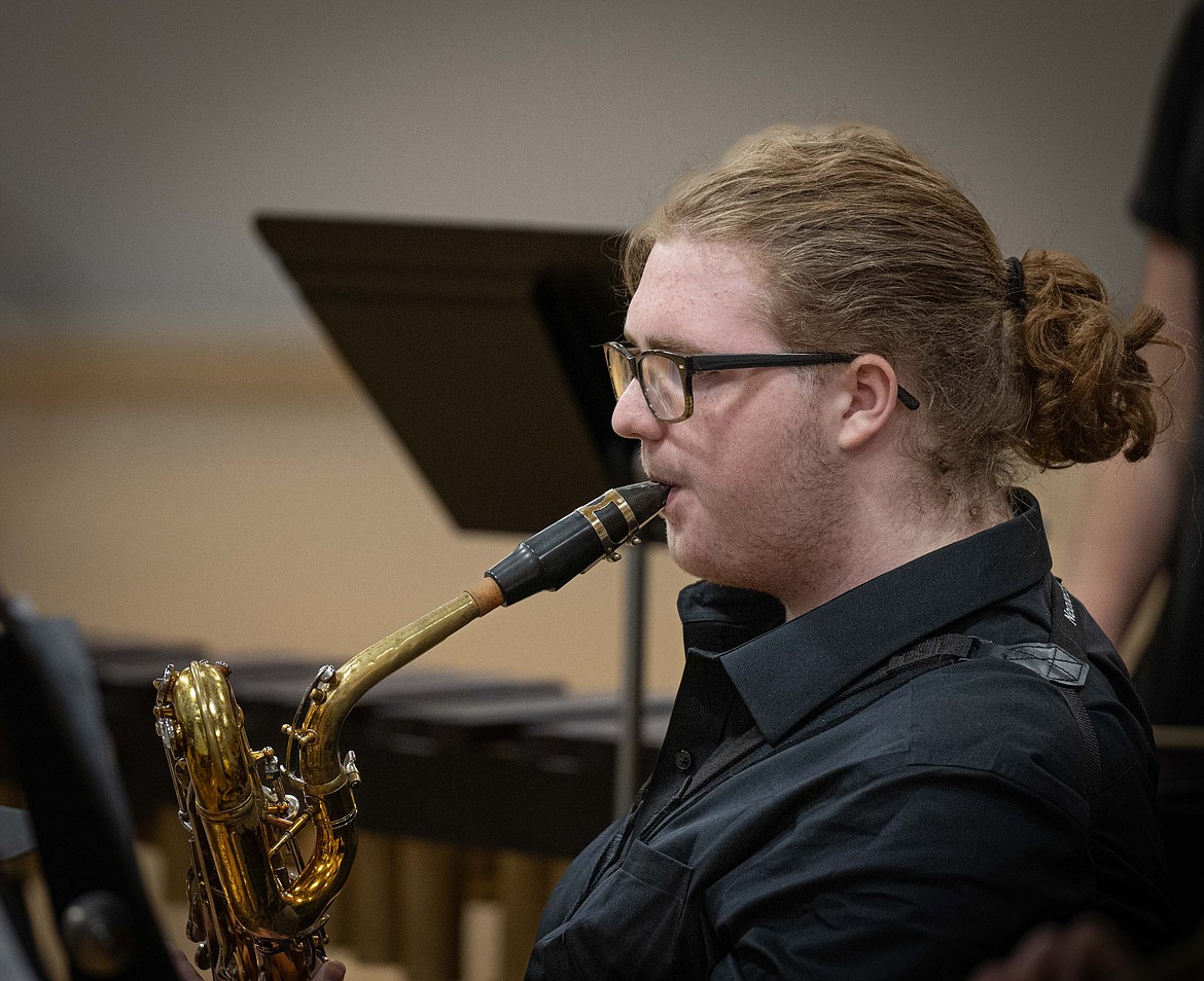 Saxophone player Keegan Huffman performs in the Plain fall concert. (Tracy Scott/Valley Press)