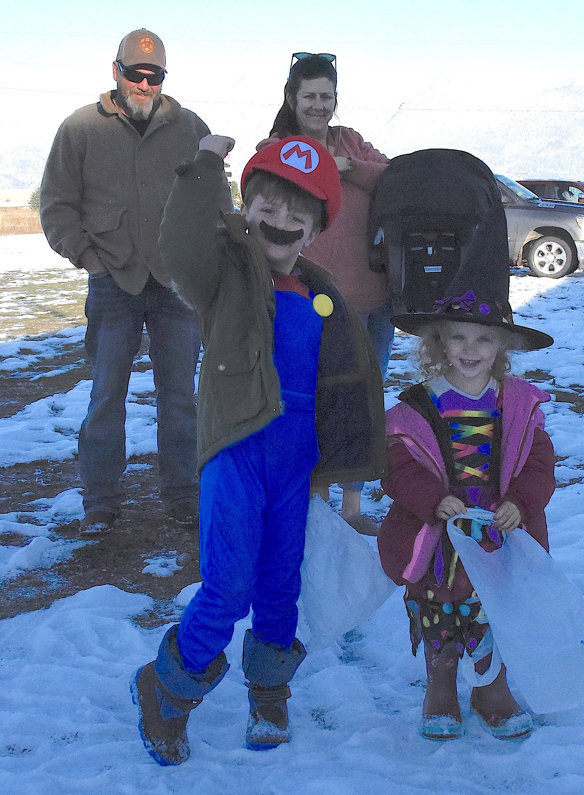 Mario and his little sister, a witch, are excited to get the the trunk or treat. (Berl Tiskus/Leadeer)
