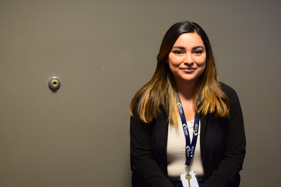 Araceli Flores, Warden High School’s new student assistance professional, sits in the high school principal’s office.