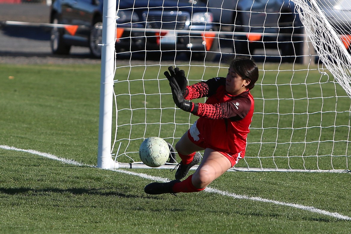 Othello junior Emi Pruneda blocks a penalty kick during a shootout in the Huskie’s 1-0 win over Ephrata on Saturday. Pruneda blocked three shots in the penalty shootout.