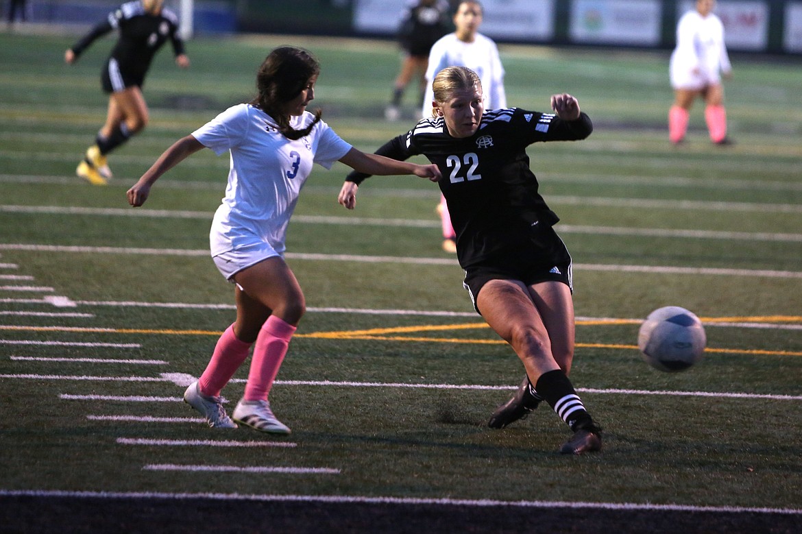 Royal junior Audrey Bergeson (22) shoots the ball in the 51st minute against La Salle on Thursday. Bergeson recorded a hat trick in Knight’s 5-1 win.