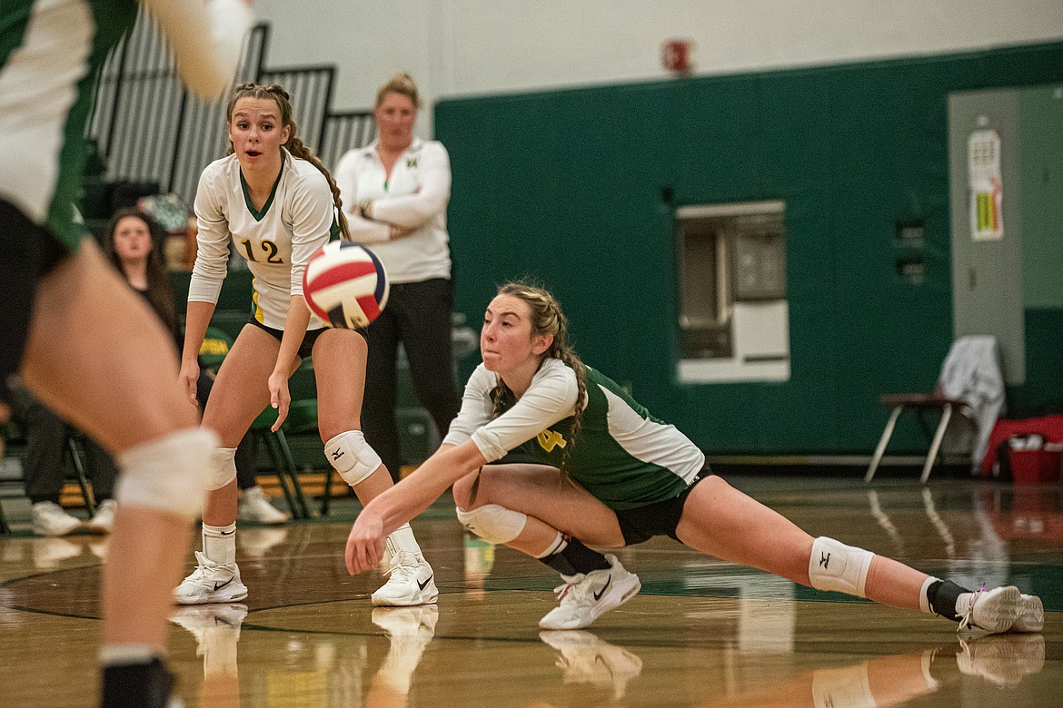 Myli Ridgeway makes a dig for the Bulldogs against Columbia Falls on Tuesday, Oct. 24. (Avery Howe photo)