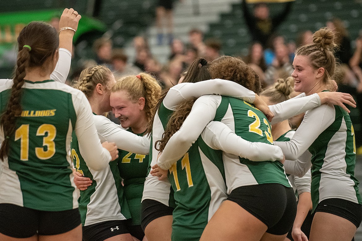 The Bulldogs celebrate their Senior Night victory over Columbia Falls on Tuesday, Oct. 24. (Avery Howe photo)