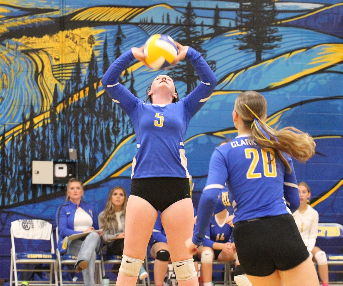 Clark Fork right-side hitter Aurora Lane sets up one of her outside hitters in a game earlier this season against Bonners Ferry.