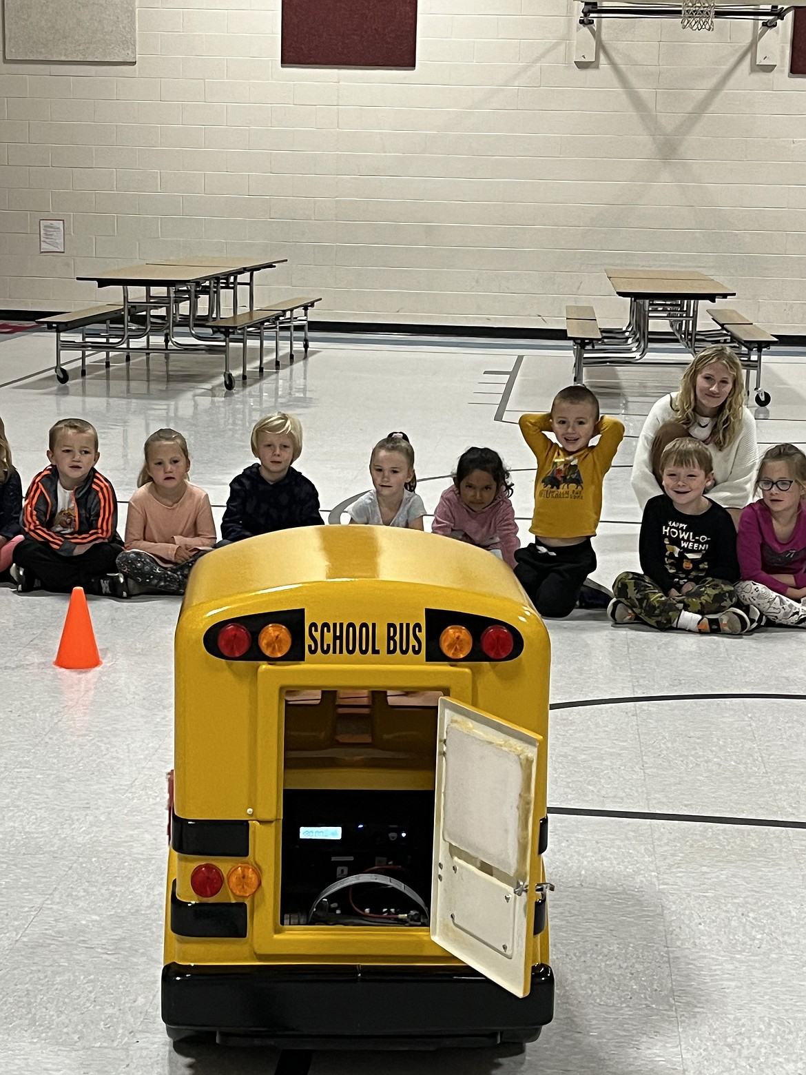 Washington Elementary students watch as Buster the Bus teaches them about bus safety during a recent presentation.