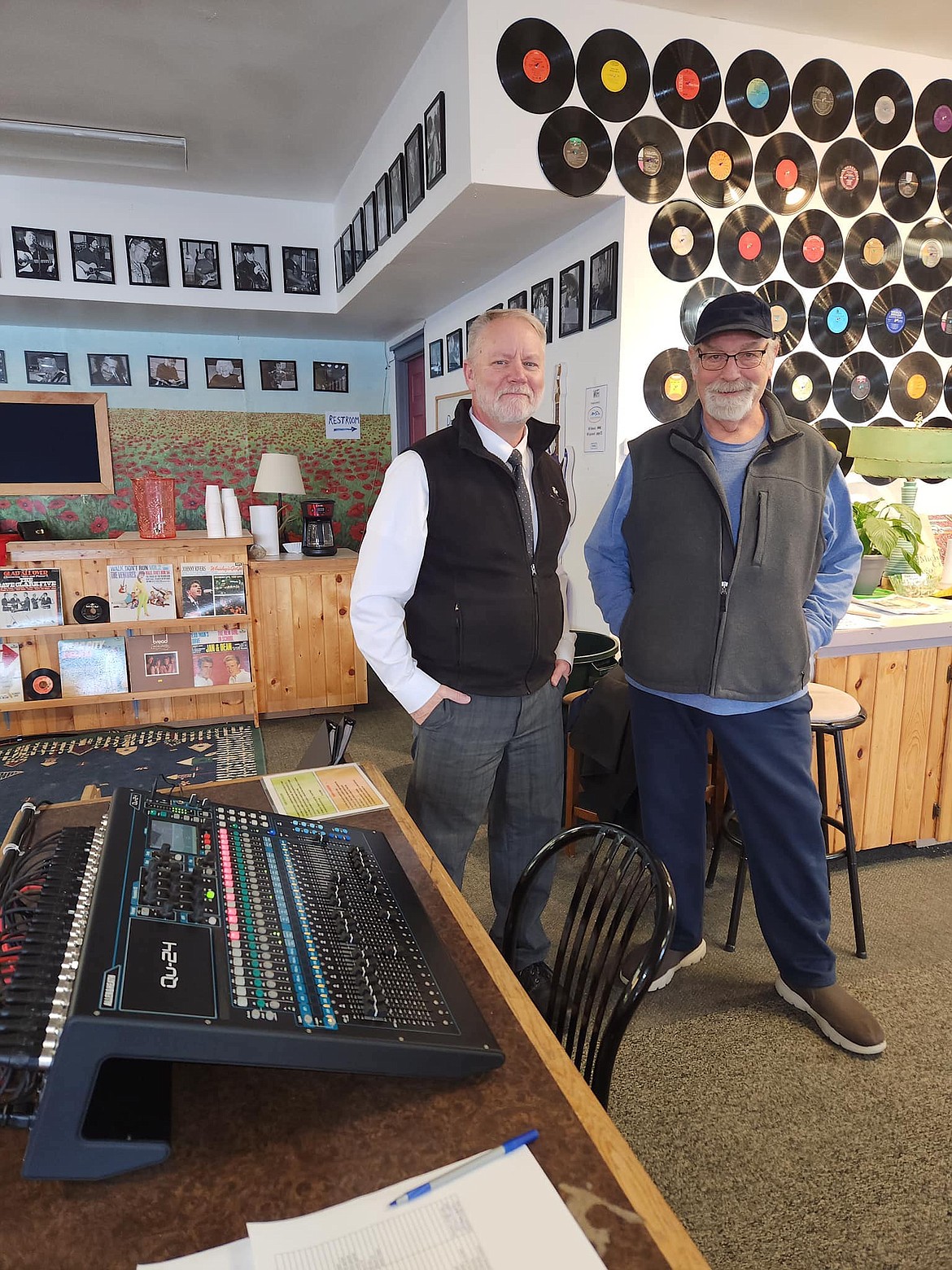 WMMC founder Doug Ruhman and John Hegel admire the co-op's new state-of-the-art sound system. (WMMC photo)