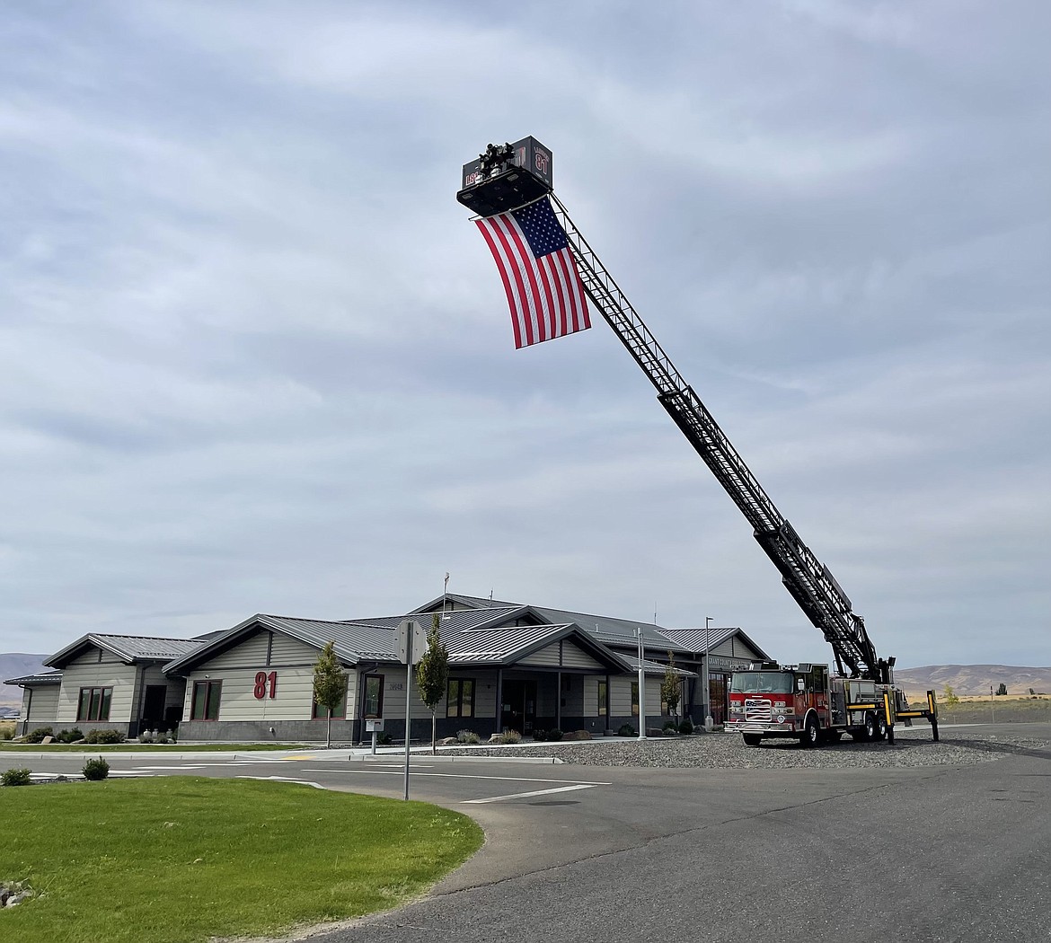 Grant County Fire District 8’s 100-foot-long ladder fire truck serves as a 9/11 memorial outside the GCFD 8 station in Mattawa.