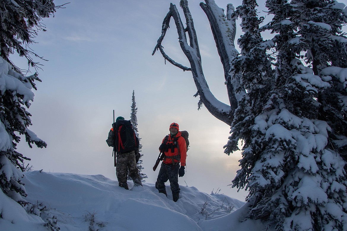 Hunters stand on a ridge near Lake Mountain on Oct. 29, 2023. (Kate Heston/Daily Inter Lake)