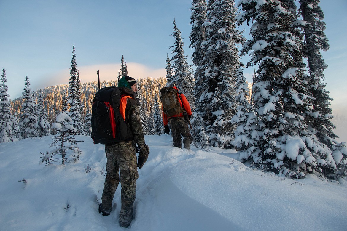 Hunters continue their hike to the ridgeline of Lake Mountain on Oct. 29, 2023. (Kate Heston/Daily Inter Lake)