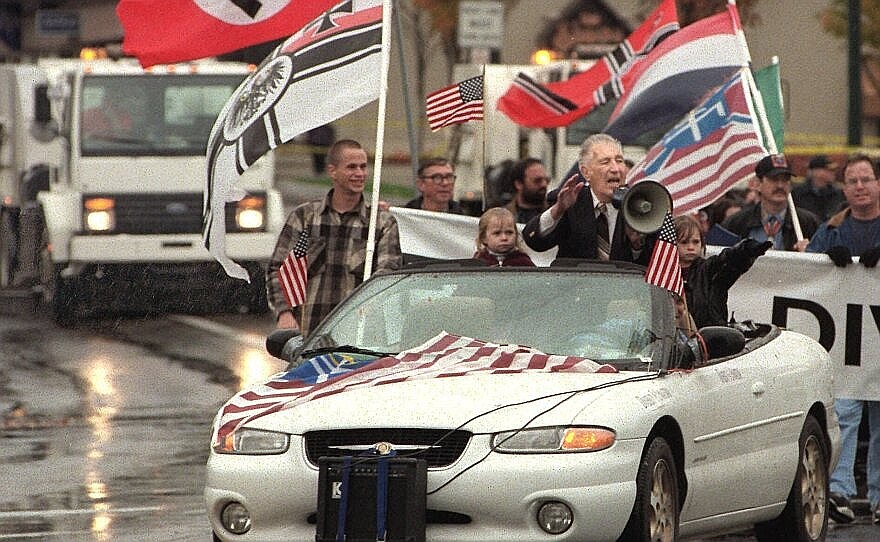 Founder Richard Butler at the 2000 Aryan Nations parade on Sherman Avenue.