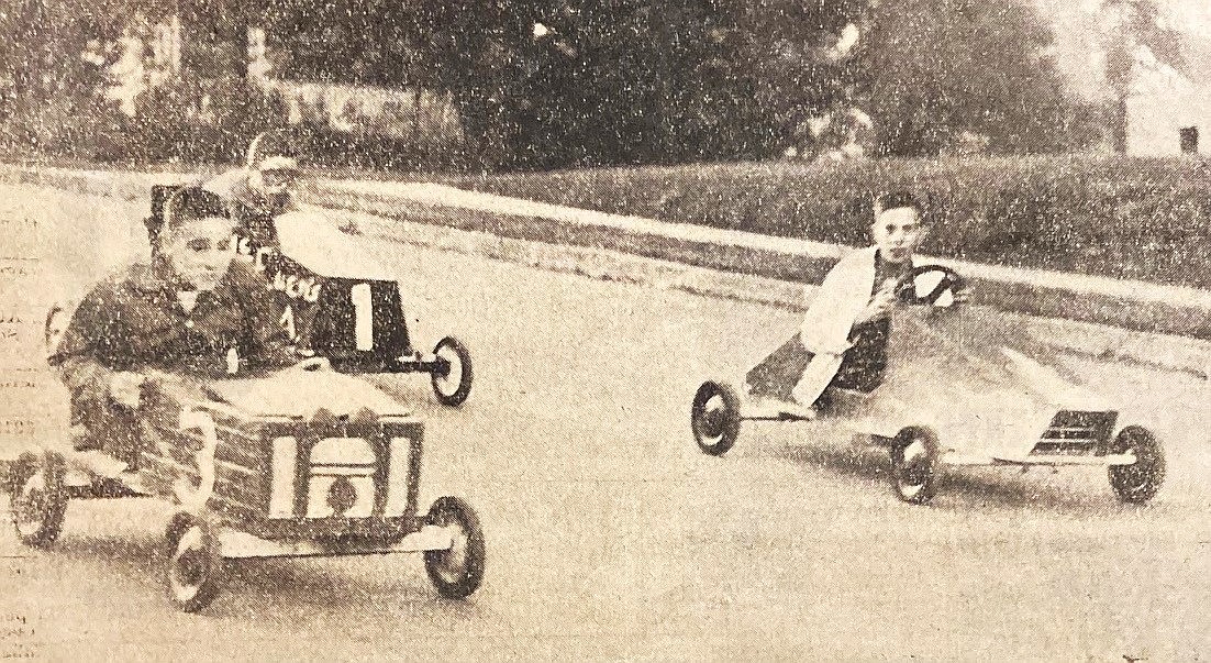 Soapbox Association racers zoom down Foster Avenue hill, from left, John Wood, David Weitz and Sandy Emerson.