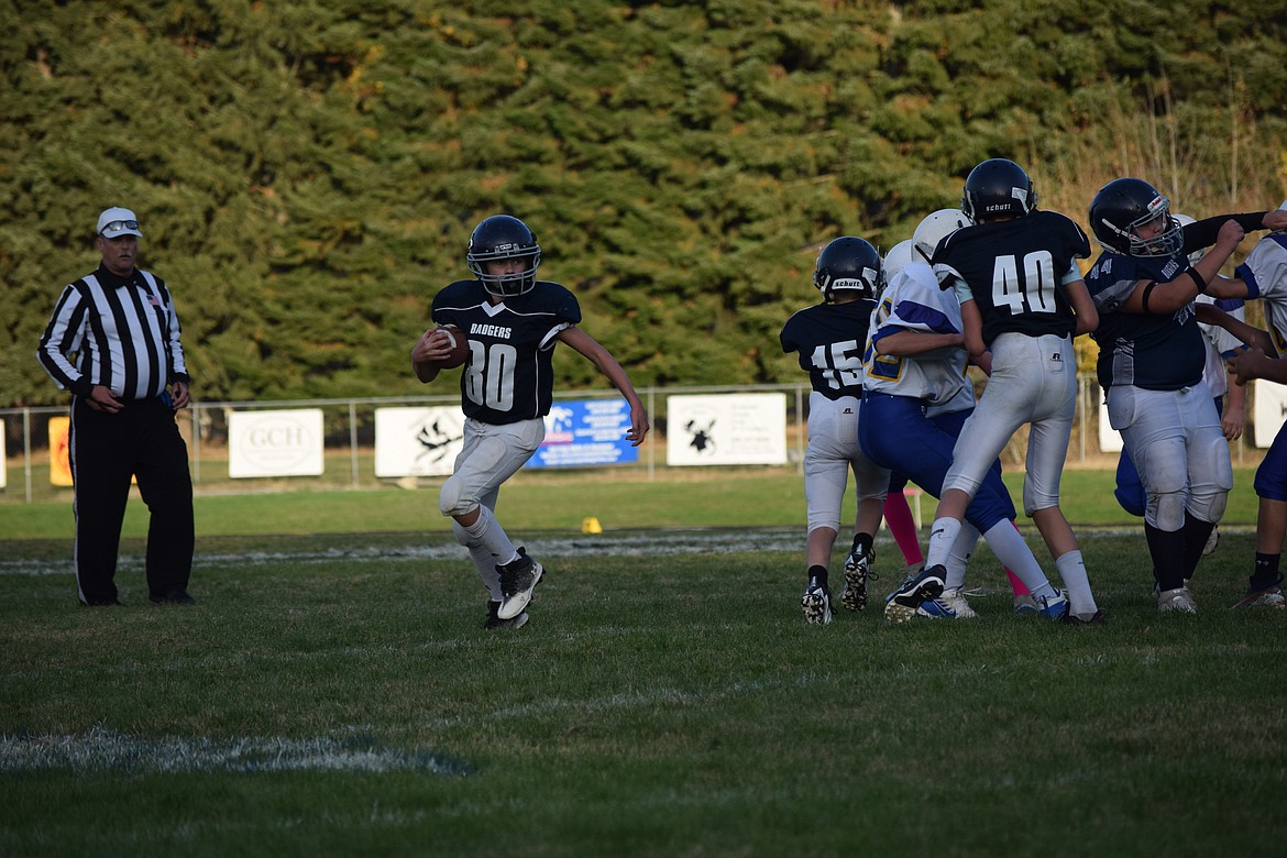 Carson Shutte runs the ball for the Badgers as Boundary County Middle School defeated the Libby Loggers, 12-6.