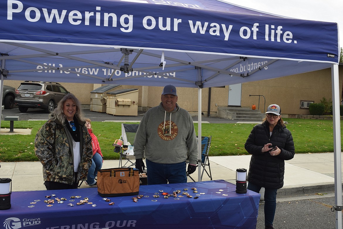 Grant County Public Utility District representatives were on hand to make sure Ephratans – and visitors from around the area – had plenty of sugar to power through the holiday.