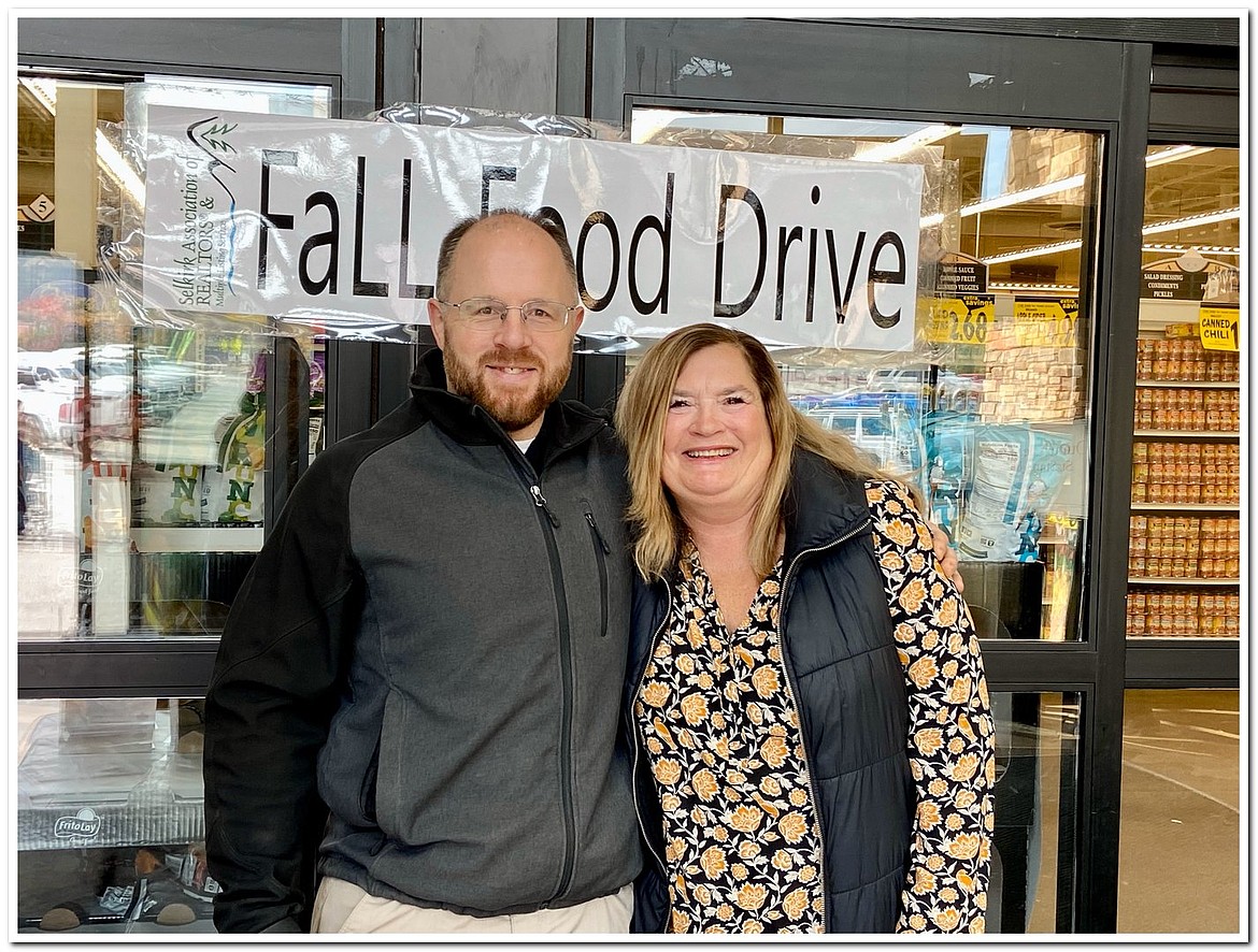 Local real estate officials and mortgage lenders volunteer at the Selkirk Association of Realtors' fall food drive.