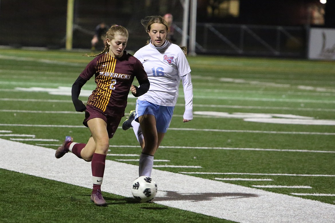 Moses Lake junior Reese Prescott (2) runs upfield with possession of the ball against West Valley (Yakima) on Tuesday night.