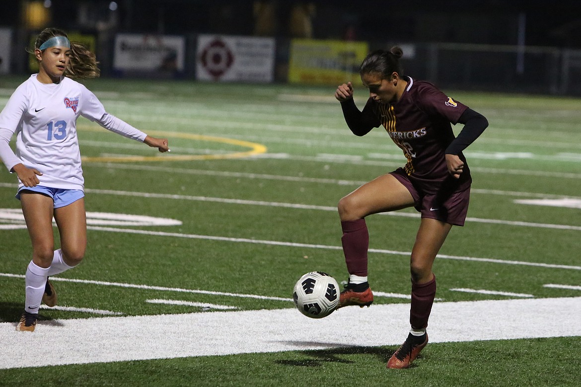 Moses Lake senior Meadow Saenz (12) corrals a pass from a teammate.