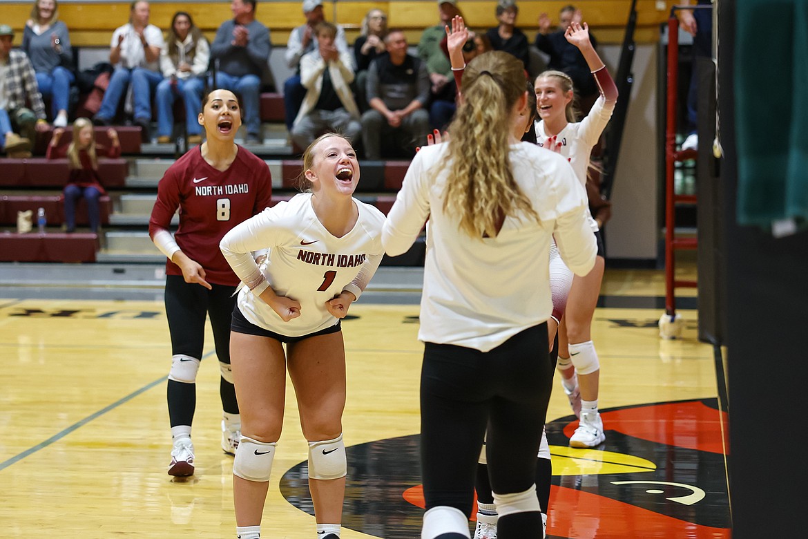 Photo by KYLE DISHAW/NIC Athletics
North Idaho College's Brooklyn Minden (1) celebrates with teammate Omayra Valle (8) after Abigail Beaton's spike during Wednesday's Northwest Athletic Conference match against the Community Colleges of Spokane at Christianson Gymnasium on Wednesday.