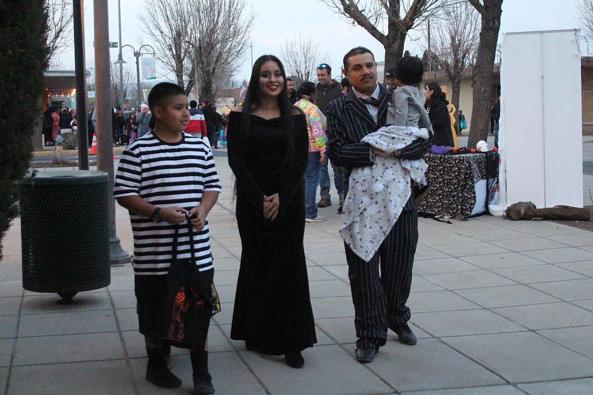 The entire Addams Family was out for trick or treat.