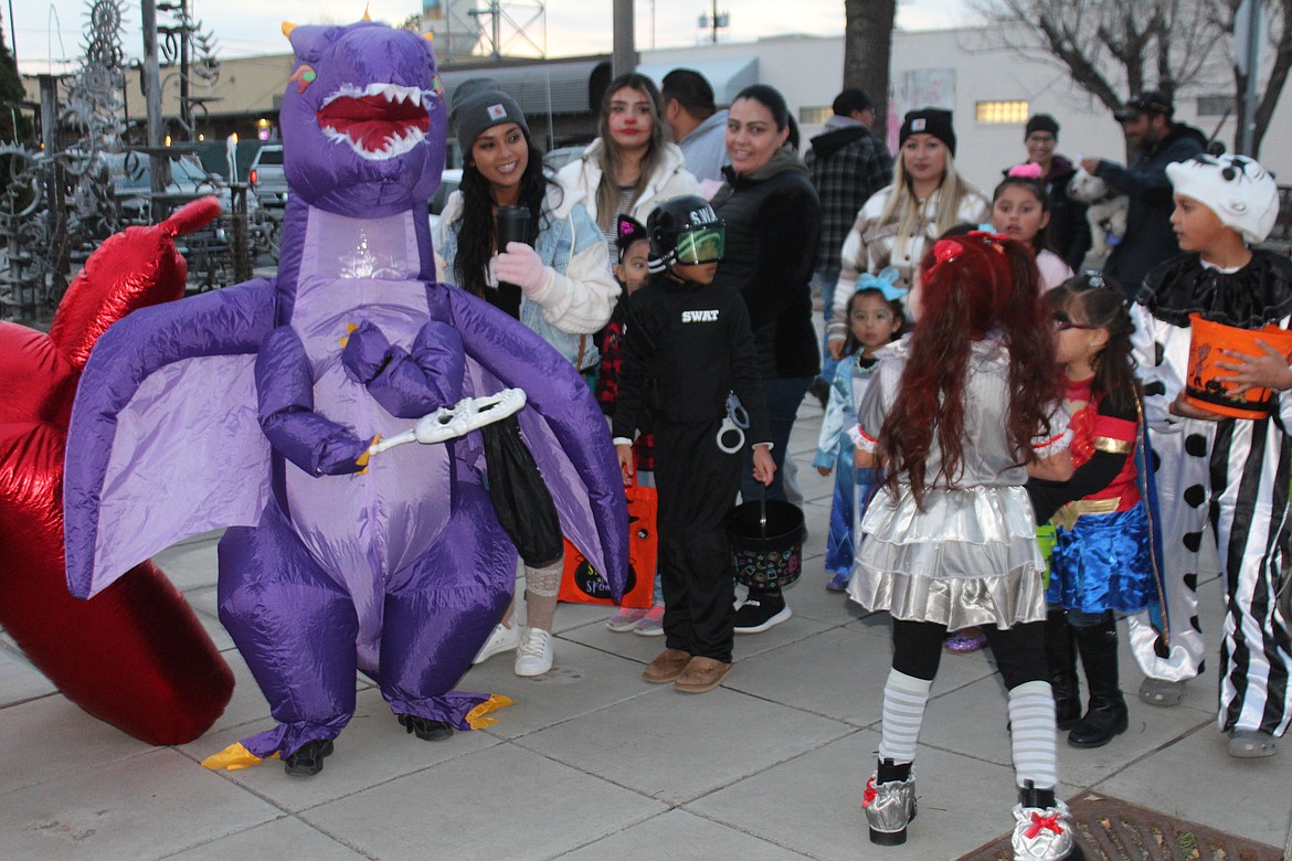 Quincy’s main street was full of all kinds of characters during the Downtown Trick or Treat Halloween night.