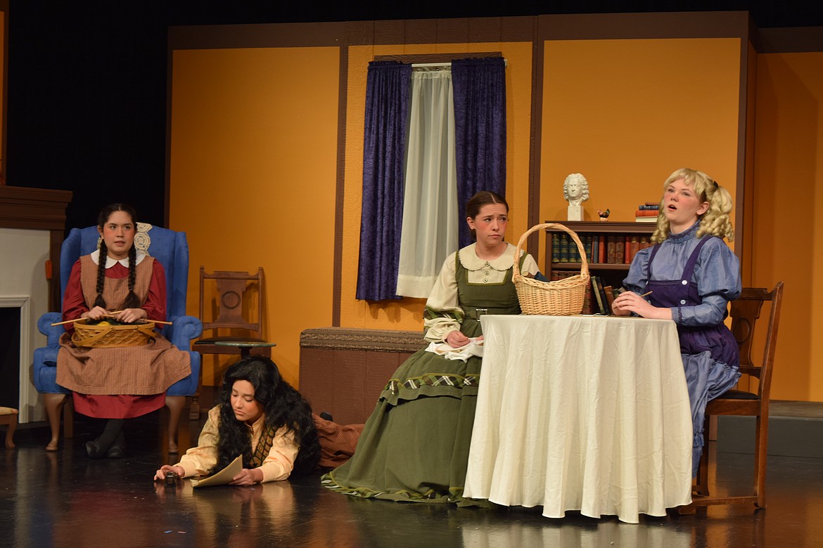 The March sisters, from left, Beth (Gisele Vazquez), Jo (Magali Marroquin), Meg (Paige Meredith) and Amy (Karli Long) spend some time together during the Othello High School production of “LIttle Women.”