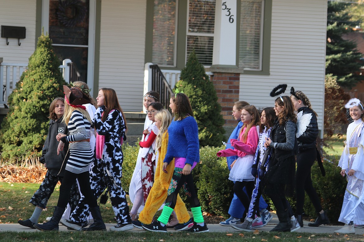 Washington Elementary students showcase their costumes as part of the school's annual Halloween Parade on Tuesday.