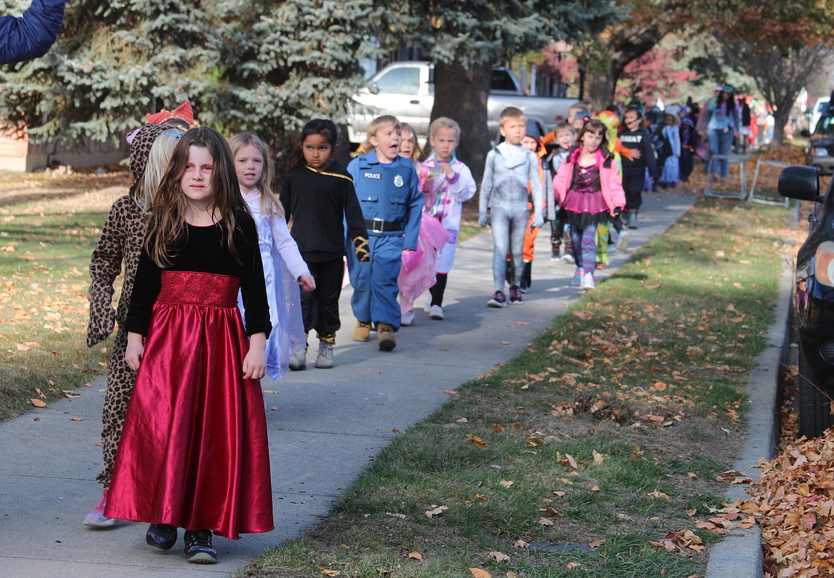 Washington Elementary students showcase their costumes as part of theschool's annual Halloween Parade on Tuesday.