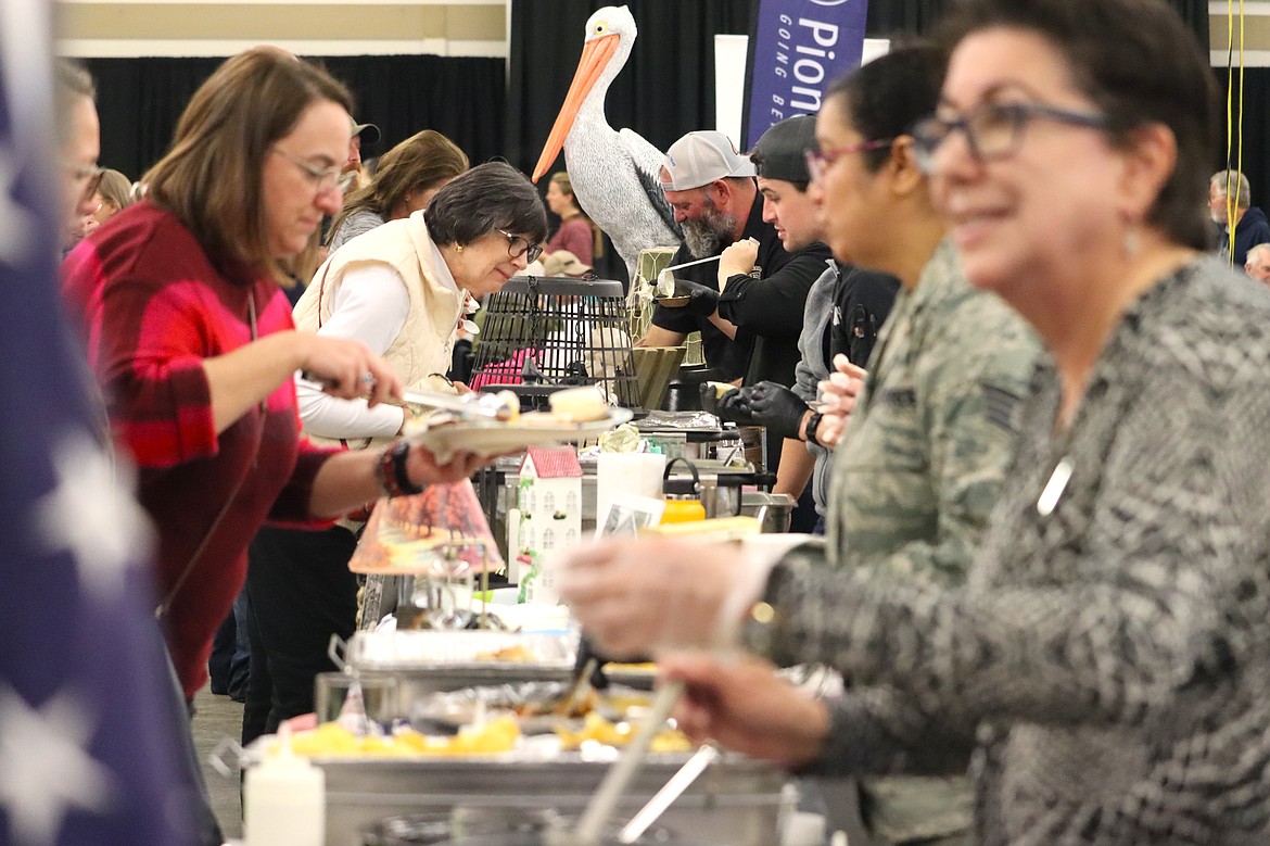 Soup is served at the "Souport The End of Homelessness" fundraiser for St. Vincent de Paul North Idaho at the Kootenai County Fairgrounds on Thursday.