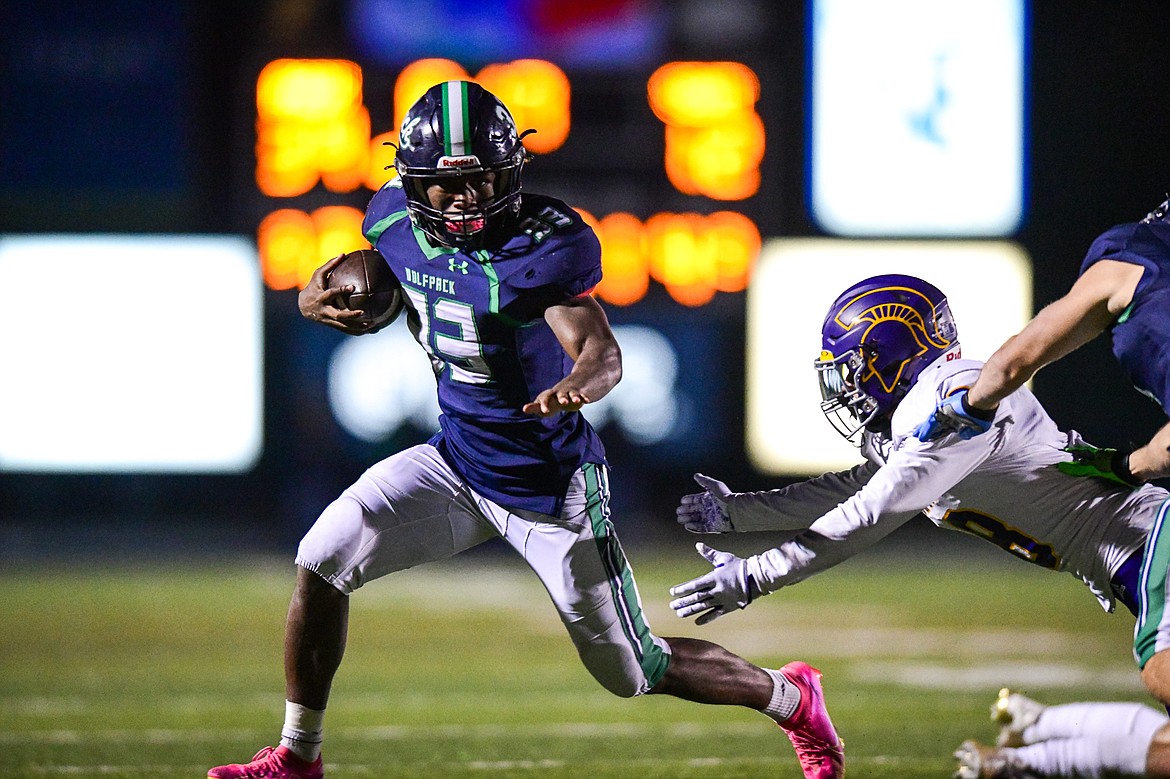 Glacier running back Kobe Dorcheus (33) scores a touchdown on a 21-yard reception in the fourth quarter against Missoula Sentinel in the quarterfinals of the Class AA playoffs at Legends Stadium on Friday, Nov. 3. (Casey Kreider/Daily Inter Lake)