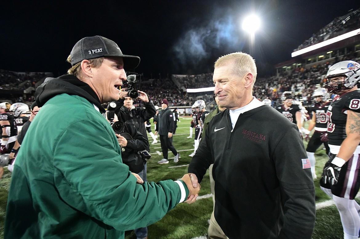 Grizzlies head coach Bobby Hauck shakes hands with Sacramento State head coach Andy Thompson after a 34-7 win at Washington-Grizzly Stadium on Saturday, Nov. 4. (Casey Kreider/Daily Inter Lake)