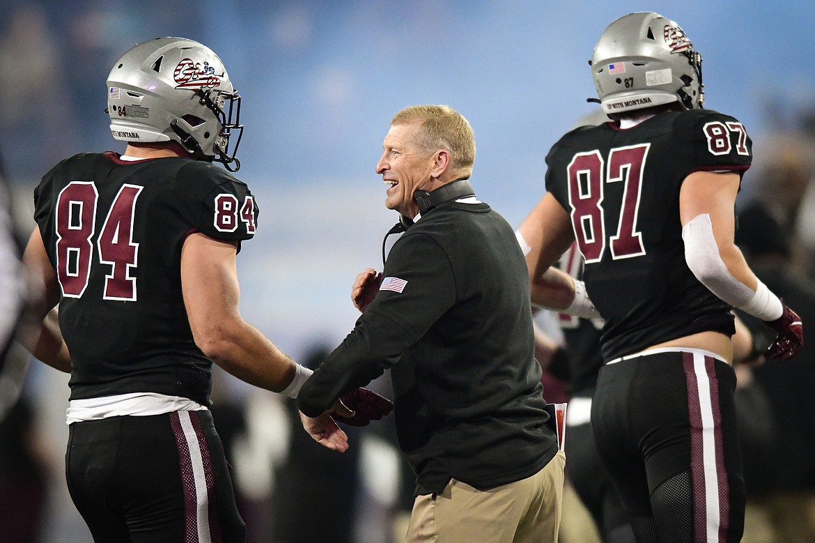 Montana Grizzlies head coach Bobby Hauck congratulates his players after a fourth-quarter touchdown against Sacramento State at Washington-Grizzly Stadium on Saturday, Nov. 4. (Casey Kreider/Daily Inter Lake)