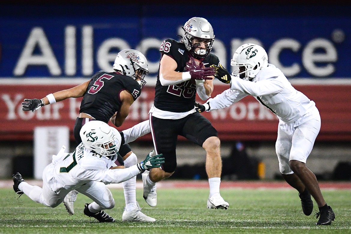 Grizzlies running back Nick Ostmo (26) picks up yardage on a run in the second quarter against Sacramento State at Washington-Grizzly Stadium on Saturday, Nov. 4. (Casey Kreider/Daily Inter Lake)