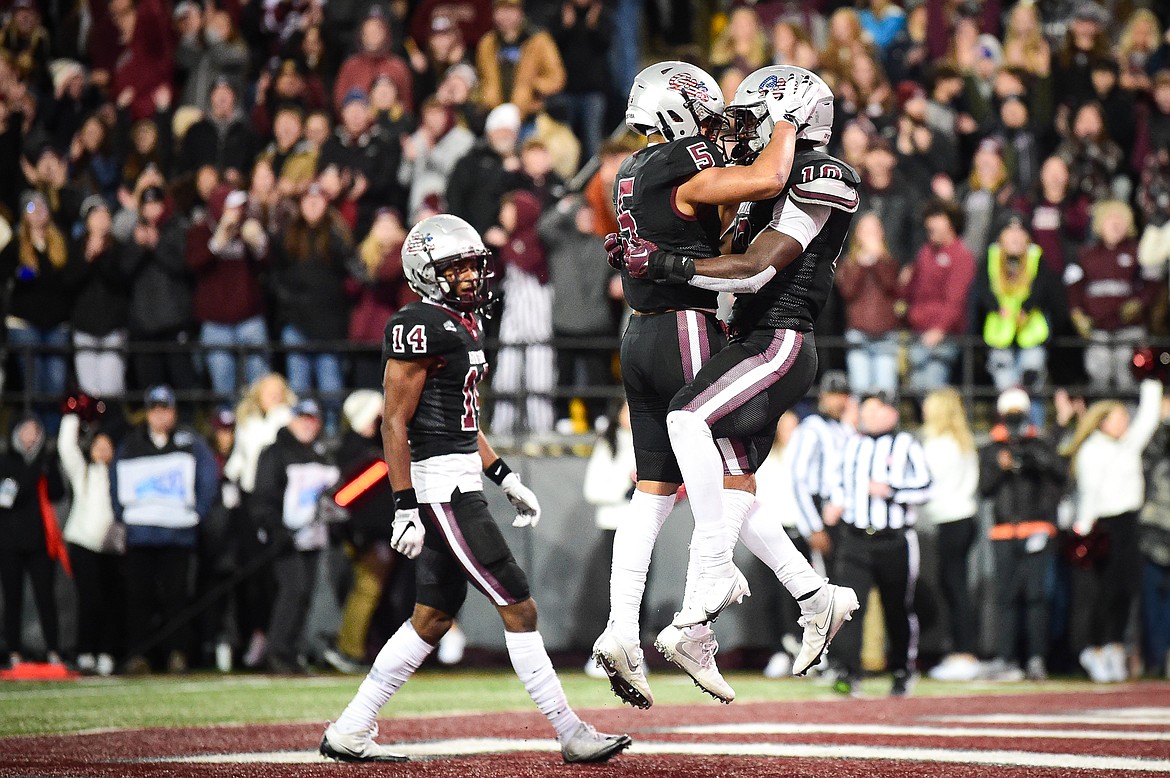 Grizzlies running back Eli Gillman (10) celebrates with Junior Bergen (5) after Gillman's 8-yard touchdown run in the first quarter against Sacramento State at Washington-Grizzly Stadium on Saturday, Nov. 4. (Casey Kreider/Daily Inter Lake)