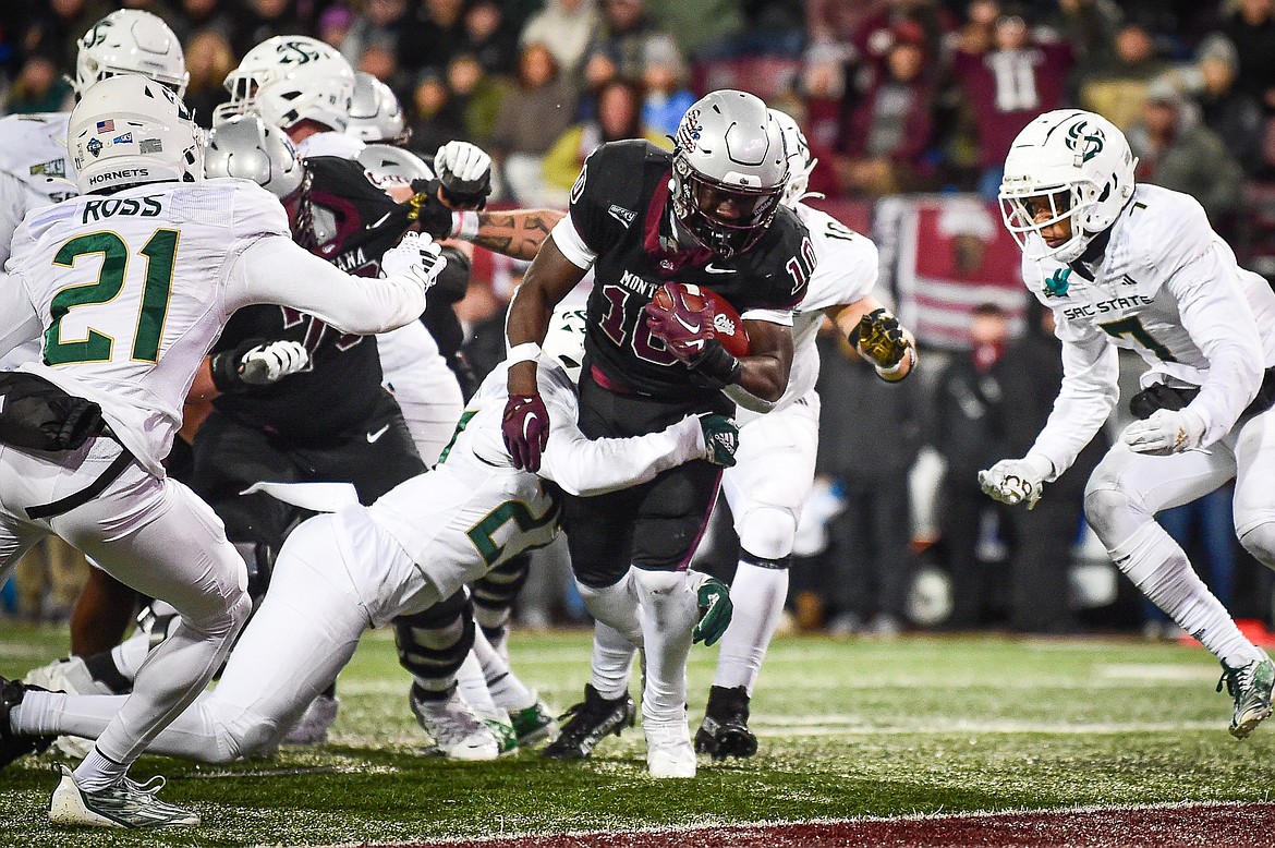 Grizzlies running back Eli Gillman (10) scores a touchdown on a 8-yard run in the first quarter against Sacramento State at Washington-Grizzly Stadium on Saturday, Nov. 4. (Casey Kreider/Daily Inter Lake)