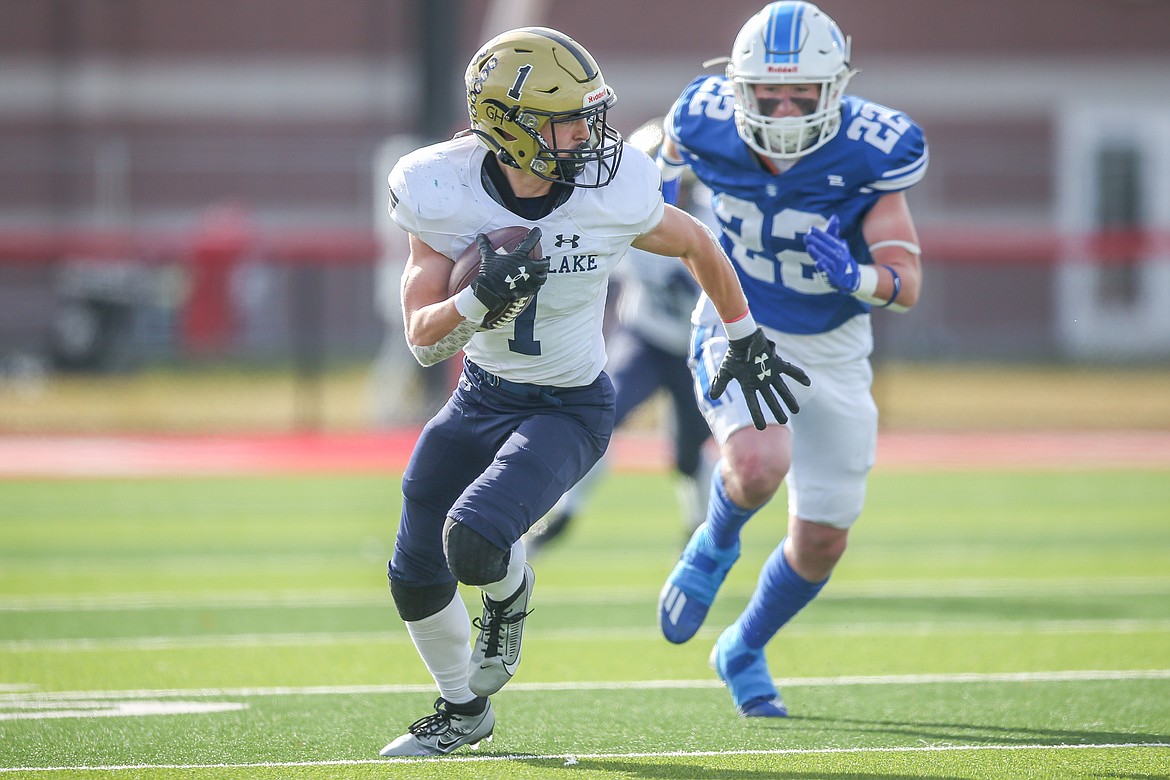 JASON DUCHOW PHOTOGRAPHY
Cooper Lenz (1) of Timberlake heads downfield as he returns an interception for a 61-yard touchdown in the first quarter Saturday against Sugar-Salem in a state 3A quarterfinal Saturday at Madison High in Rexburg.