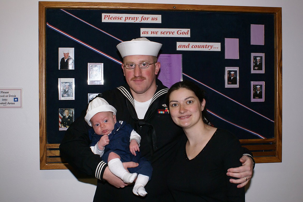 The Woelfle family is pictured at church after his return from a seven-month deployment.